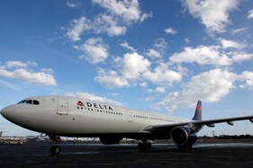 Atlanta-Bound Delta Flight Makes Emergency Landing After Unruly Passenger Attacks Flight Attendants