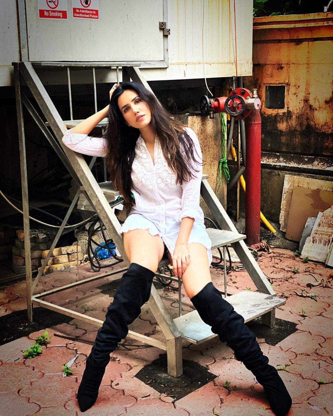 Sonnalli Seygall looks hot in the shirtdress and thigh-high boots. (Image: Instagram) Sonnalli Seygall looks hot in the shirtdress and thigh-high boots. (Image: Instagram)