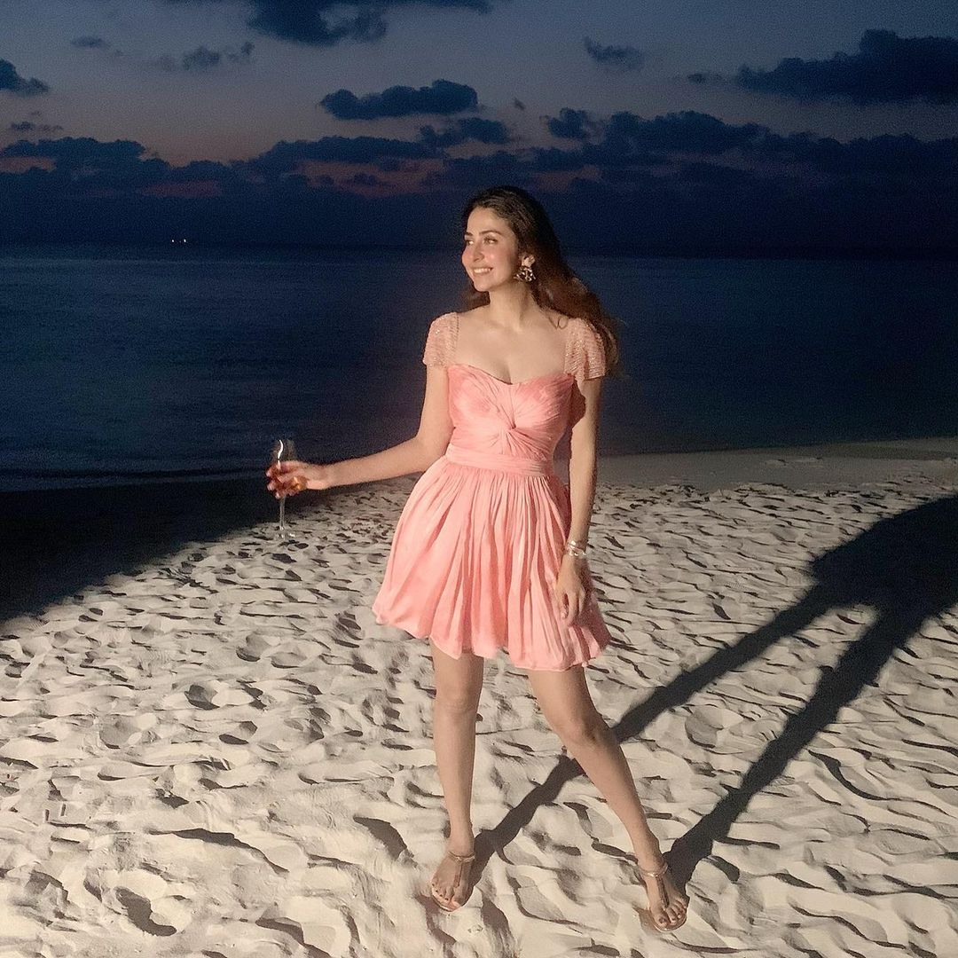Malvika Raaj looks sexy in the peach dress. (Image: Instagram) Malvika Raaj looks sexy in the peach dress. (Image: Instagram)