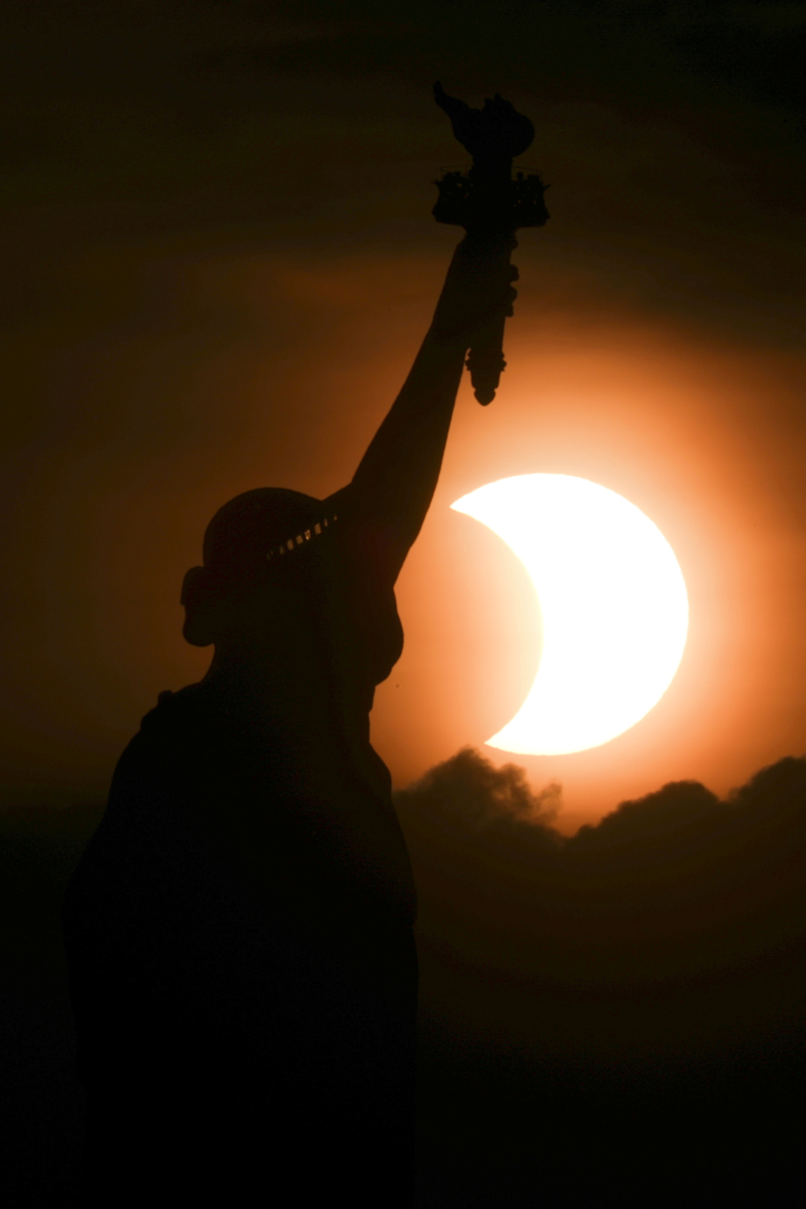 In Photos Solar Eclipse Forming 'Ring of Fire' Glows in World's