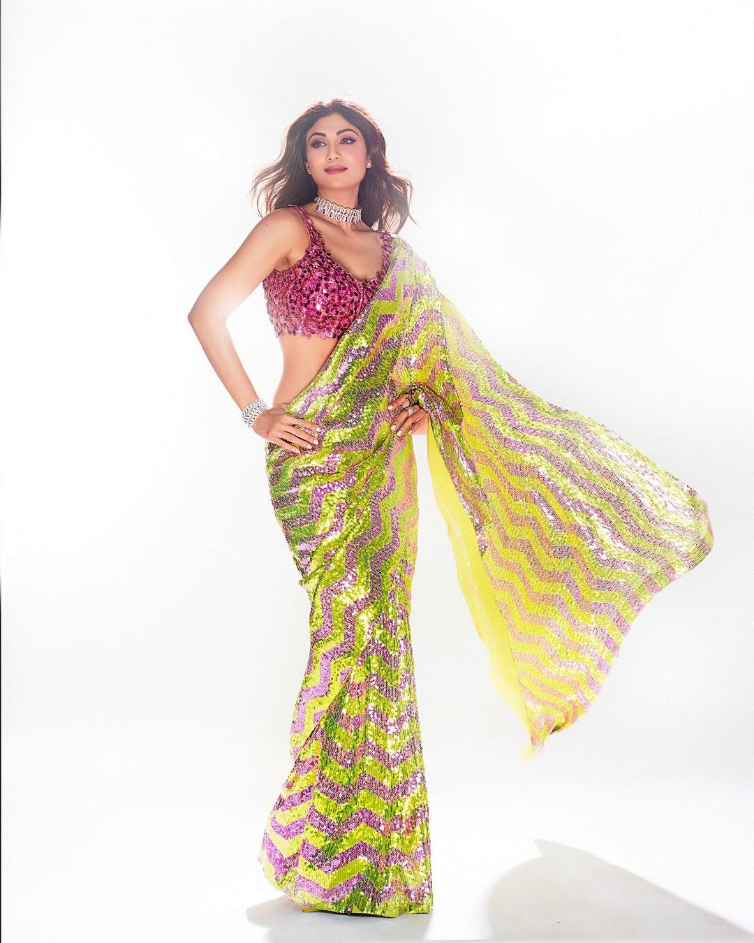  Shilpa Shetty Kundra looks sizzling in the shimmering striped saree. (Image: Instagram)