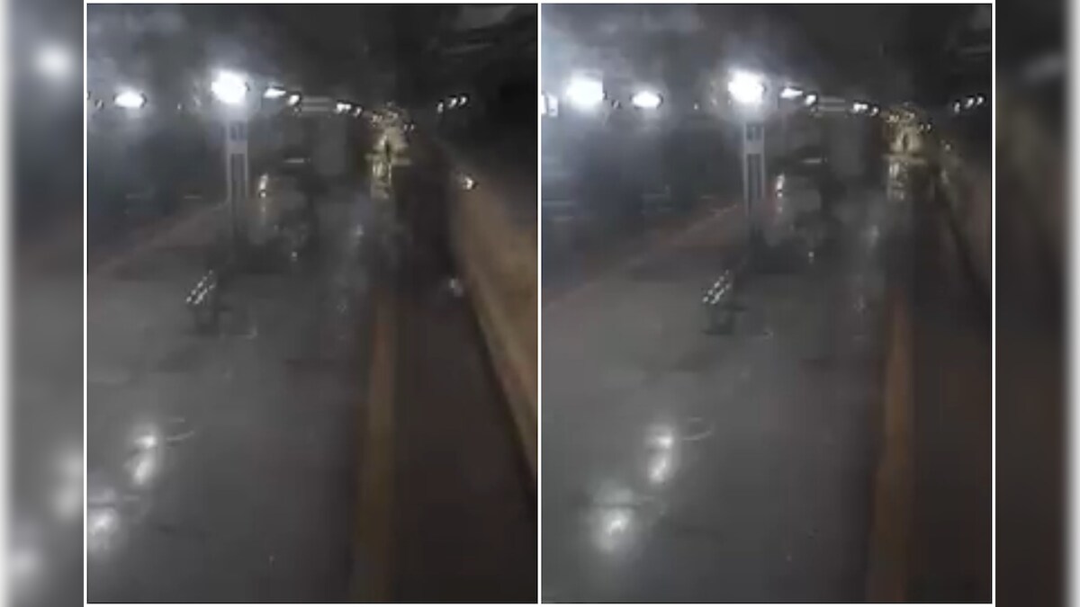 Watch Mumbai Man Slips While Boarding Moving Train Railway Staff