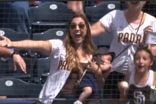 Video grab of mother at baseball game. 