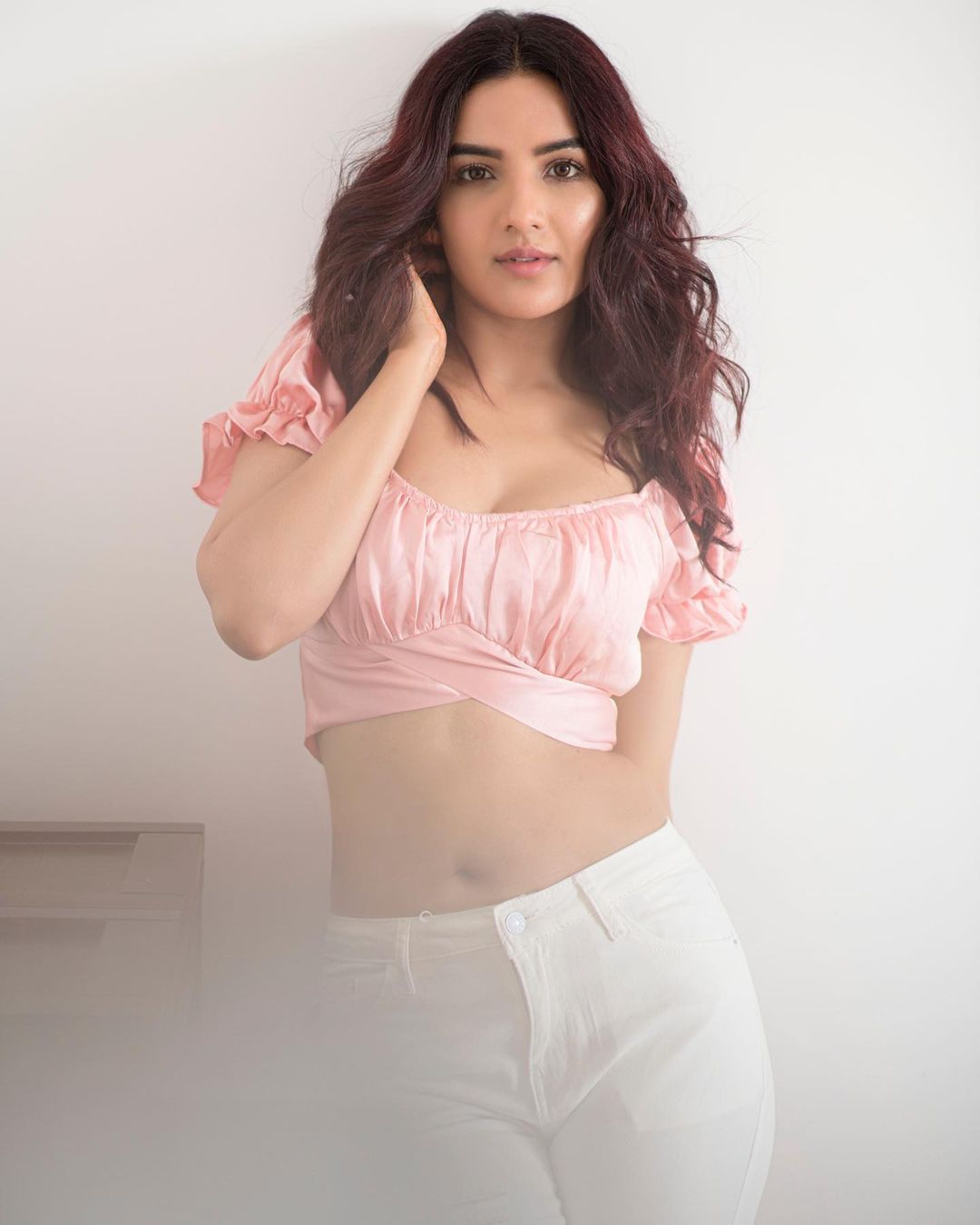  Jasmin Bhasin works her charm in the crop top and white pants. (Image: Instagram)