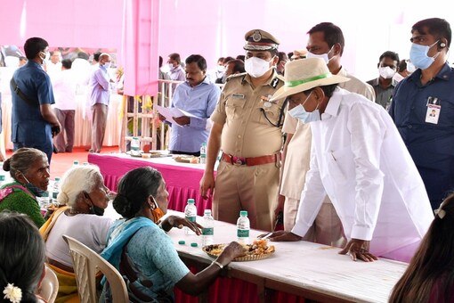 Telangana CM K Chandrasekhar Rao lunches with people in adopted village. (Image: IANS)