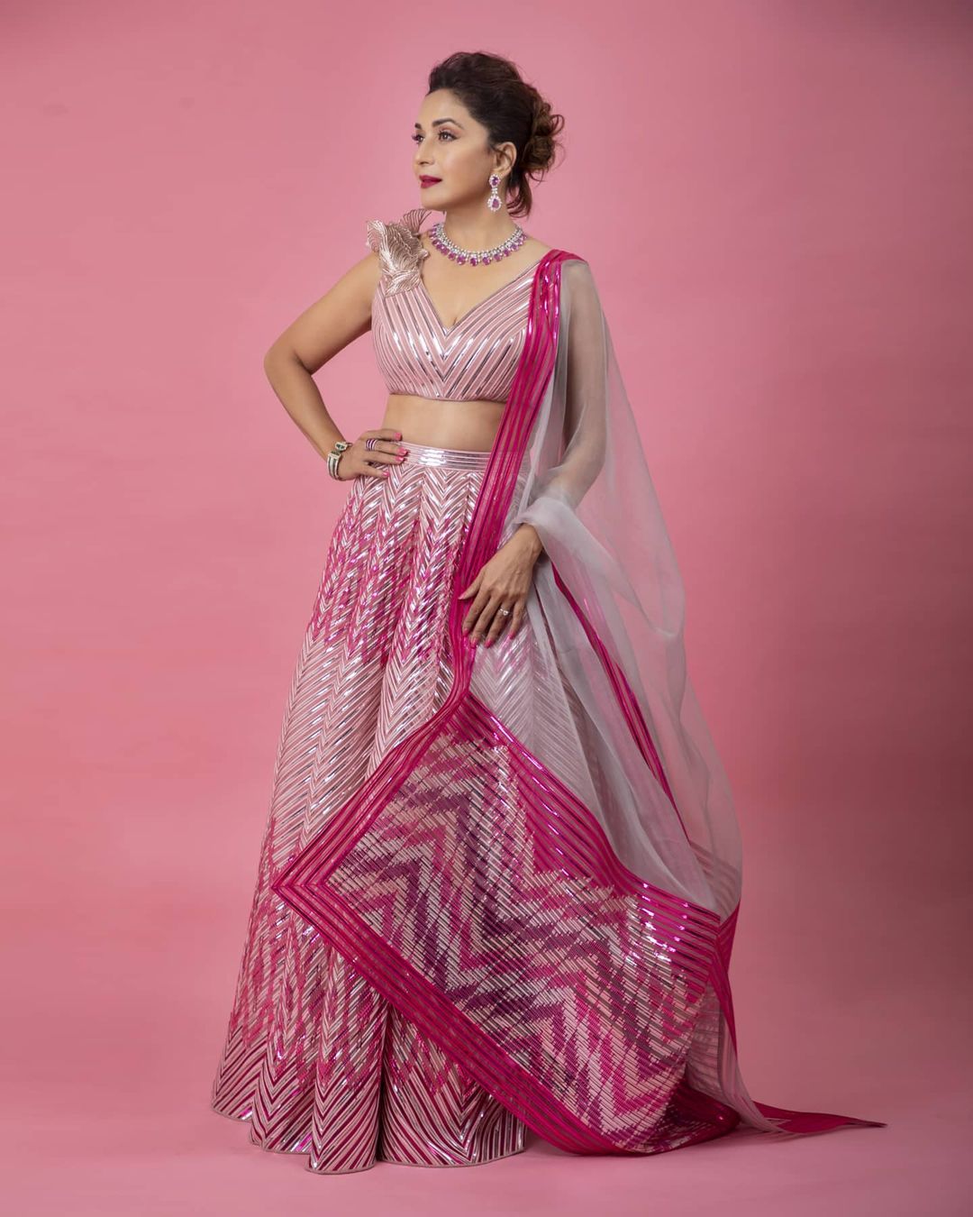  Madhuri Dixit Nene looks stylish in the pink and silver lehenga. (Image: Instagram)
