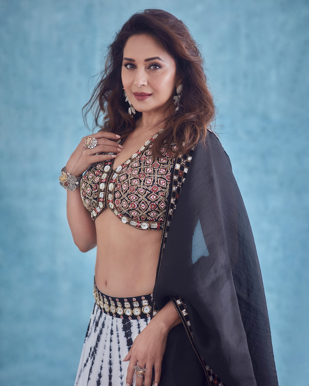  Madhuri Dixit Nene flaunts her toned abs in the lehenga. Check out the diva slaying ethnic fashion like a pro. (Image: Instagram)