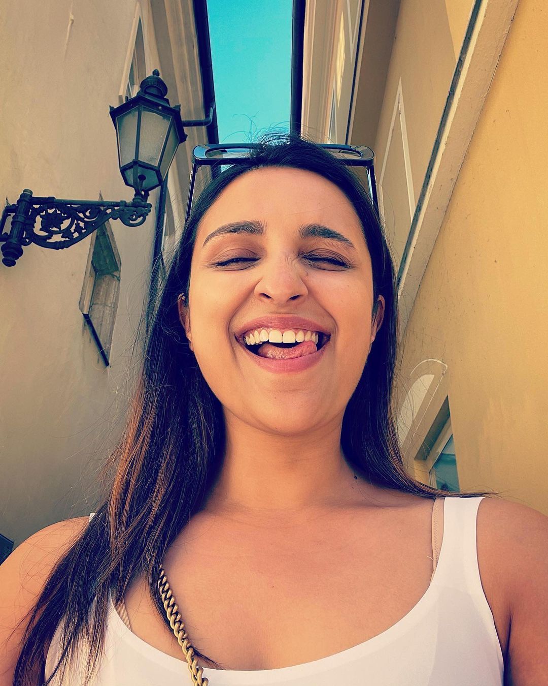  Parineeti Chopra keeps it au naturel in a white tank top. (Image: Instagram)