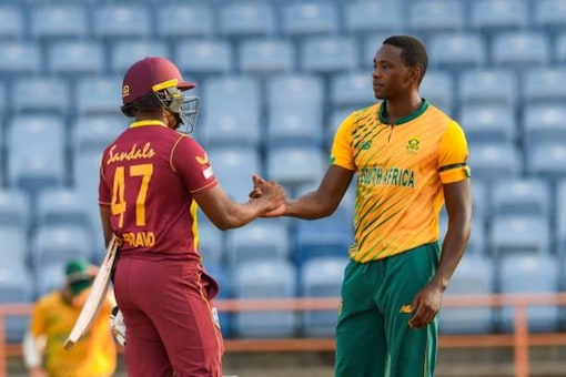 Dwayne Bravo (L) of West Indies congratulates Kagiso Rabada (R) of South Africa for winning the 3rd T20I between West Indies and South Africa at Grenada National Cricket Stadium, Saint George's, Grenada, on June 29, 2021. (Photo by Randy Brooks / AFP) (Photo by RANDY BROOKS/AFP via Getty Images