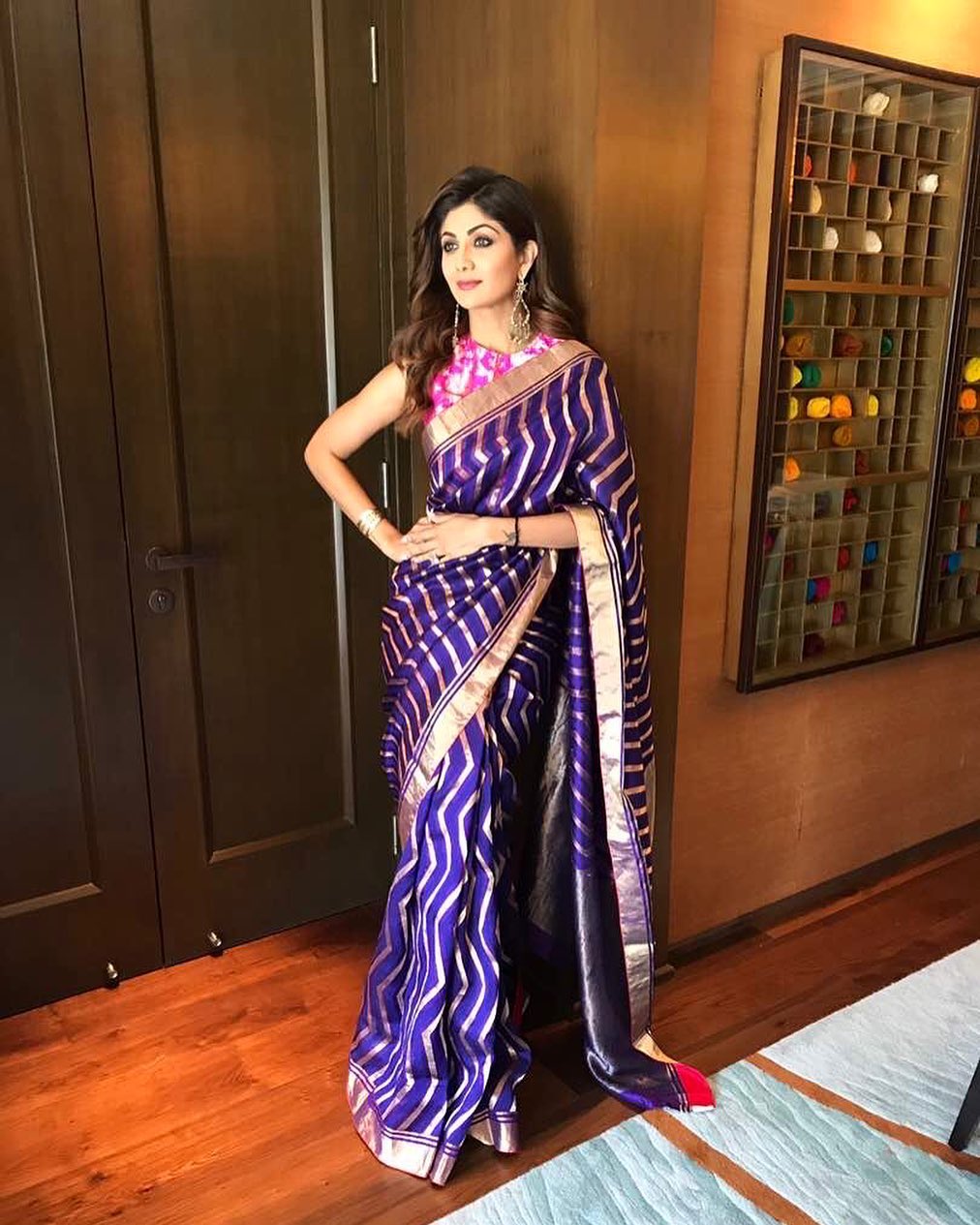 Shilpa Shetty keeps it traditional in the purple silk saree.