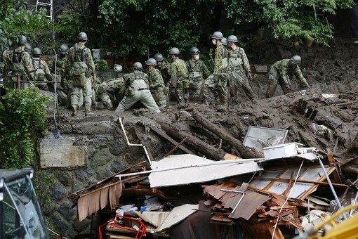 Members of Japanese Self-Defence Forces conduct rescue and search operartion at a mudslide site caused by heavy rain at Izusan district in Atami, west of Tokyo, Japan. (File photo/Reuters)