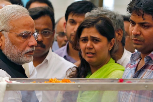 Pankaja Munde, and Narendra Modi. File Photo. Reuters 