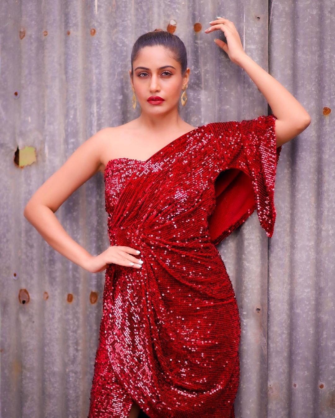  Surbhi Chandna looks super glamorous in the sequinned red dress. (Image: Instagram)
