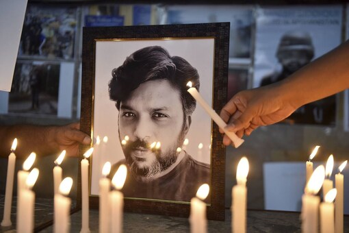 Candlelight praying meeting held in remembrance of Danish Siddiqui in New Delhi, Saturday. (PTI)