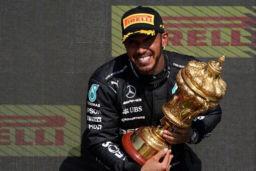 Lewis Hamilton celebrates after winning the British Formula One Grand Prix (AP)