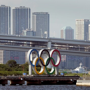 Olympic rings float on a barge ahead of the 2020 Summer Olympics (AP)
