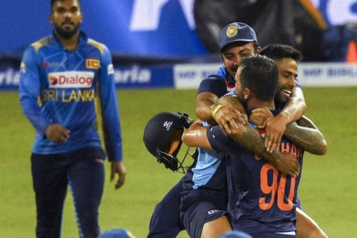 India cricketers Deepak Chahar and Suryakumar Yadav celebrate India's victory against Sri Lanka in Colombo.