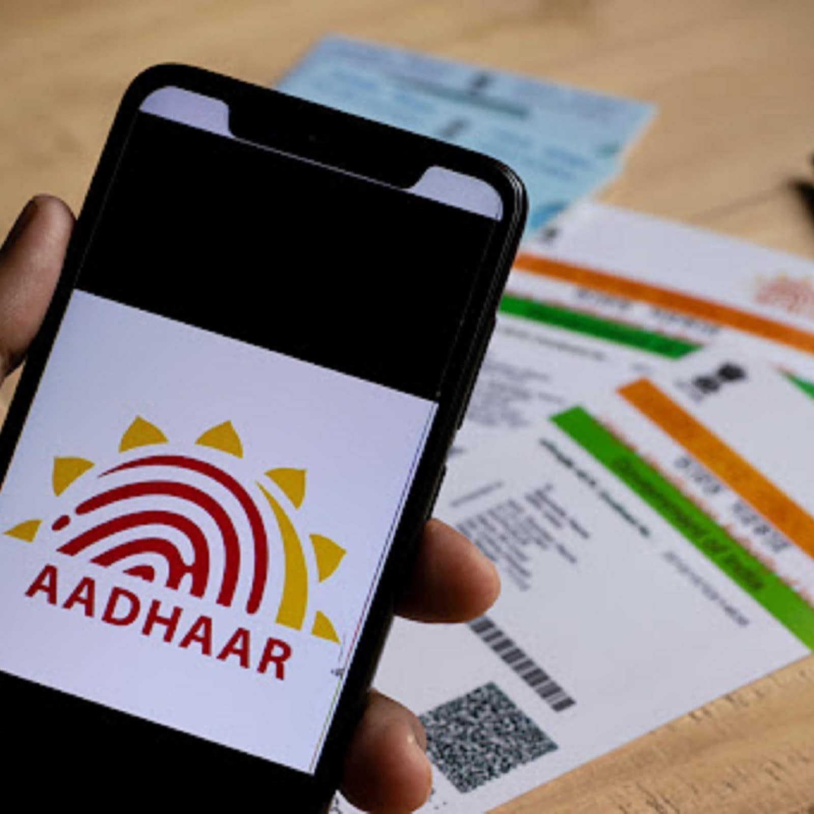 how to find aadhar card number with name online