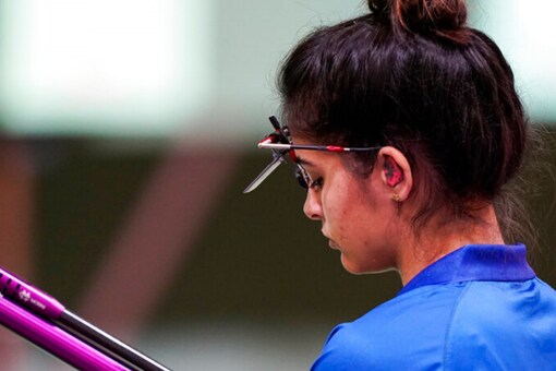 Manu Bhaker checks her gun at Tokyo Olympics (AP)