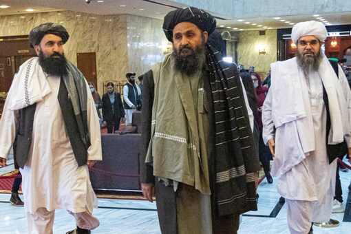 Mullah Abdul Ghani Baradar, the Taliban's deputy leader and negotiator, and other delegation members attend the Afghan peace conference in Moscow. (File photo)