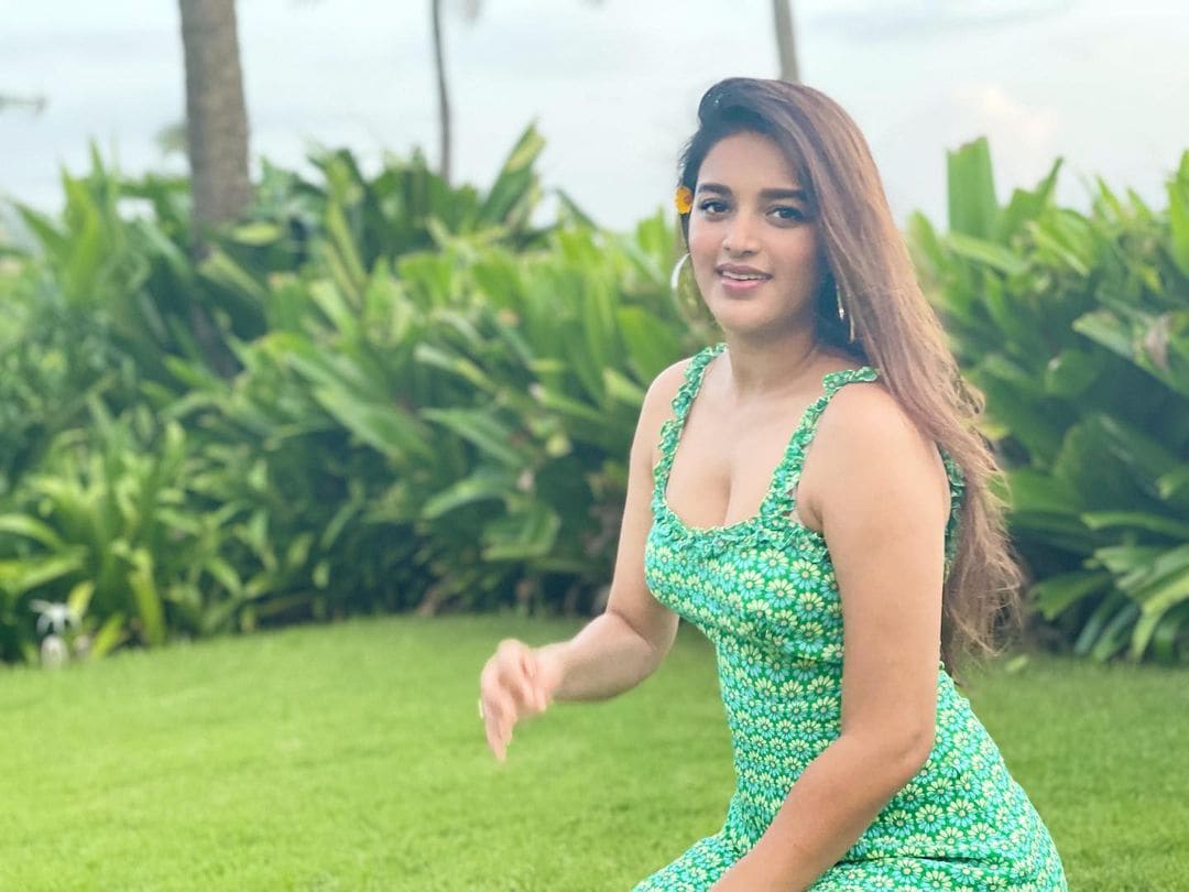 Nidhhi Agerwal Looks Charming In Floral Green Dress, See The Tollywood  Beautys Sexy Pictures - News18