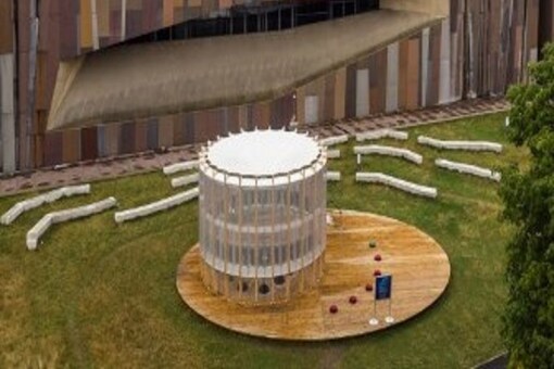 The bubble is outfitted with dozens of glass cylinders containing algae immersed in water that feast on air being pumped in from below. (Image Credit: AFP)