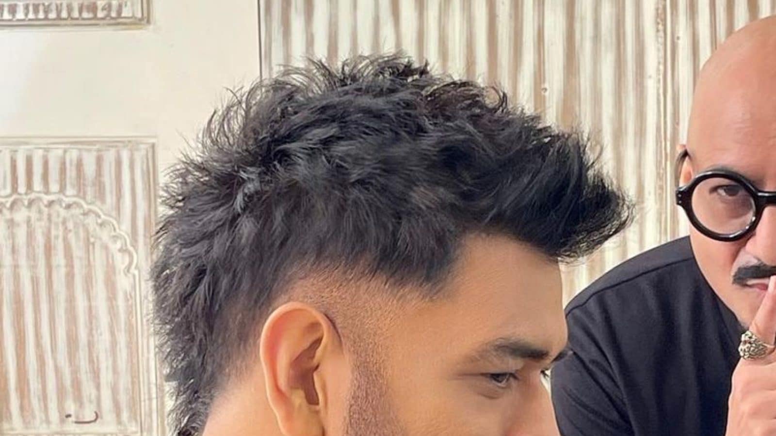 Dhoni's new hairstyle a rage among fans