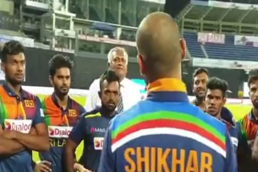 Shikhar Dhawan shares tips and tricks with a young sri lankan side.