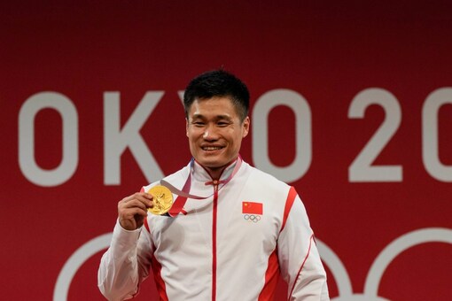 Chinese Lyu Xiaojun Oldest Weightlifter to Win Olympics Gold
