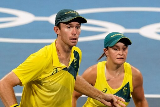 John Peers(L) and Ashleigh Barty(R) of Australia in action (AP)