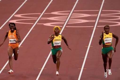 The brick-red track is made by Mondo, a company that's been around since 1948 and has been the supplier for 12 Olympic Games. (AP Photo)