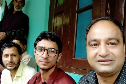 Tanveer Ahmed Khan (in the middle) with his family Tanveer Ahmed Khan (in the middle) with his family