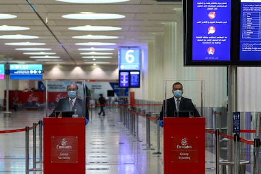 The pandemic has prompted Abu Dhabi to erect a hard border with Dubai, forcing all drivers to come to a halt for vaccination and COVID checks. (Reuters)