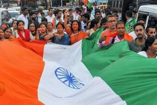 BJP supporters celebrate the central government's move to revoke Article 370 in Jammu and Kashmir. (File photo: PTI)