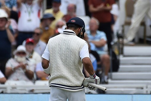Virat Kohli walks back to the dressing room after being dismissed for a duck by James Anderson at Trent Bridge during first Test.