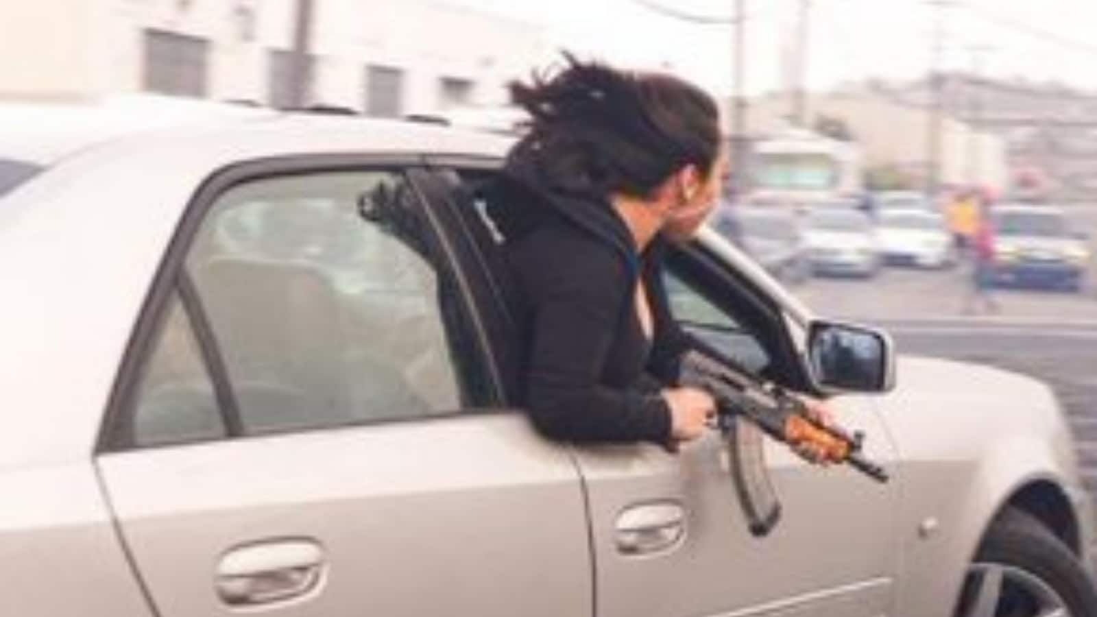 US Woman Leans Out of Moving Car Holding AK-47 in Viral Photo, Cops Seize Vehicle