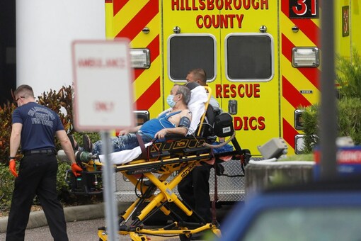 Hillsborough County Rescue first responders admit a COVID-19 patient to the emergency room at a hospital in Tampa, Florida, US. (Reuters)
