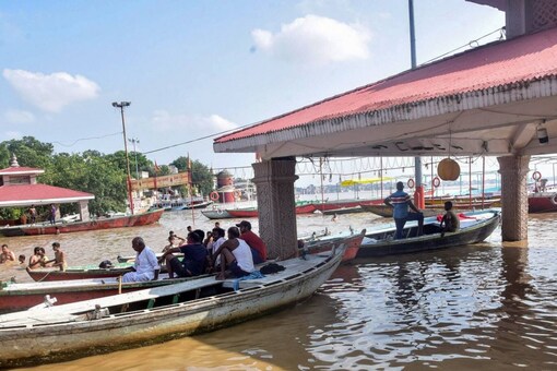 Varanasi: Assi Ghat flooded due to rising water level of Ganga river after heavy rains, in Varanasi. (PTI Photo)
