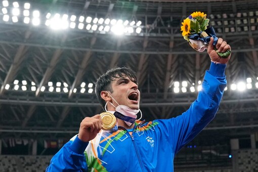 Neeraj Chopra with the gold medal at Tokyo Olympics. (AP Photo)