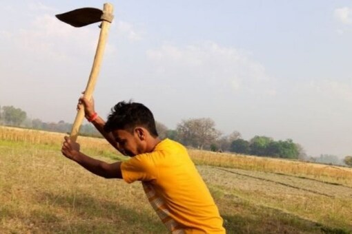 Ashish is a BSc graduate but is having to work at his farm to support the education of his younger sisters. (Image: Azeem Mirza)