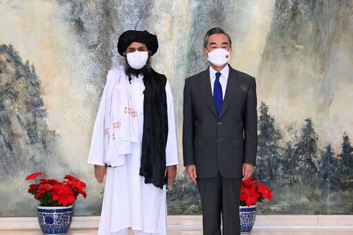 Chinese Foreign Minister Wang Yi meets Taliban's Mullah Abdul Ghani Baradar in Tianjin, China, July 28, 2021. (Li Ran/Xinhua via REUTERS)