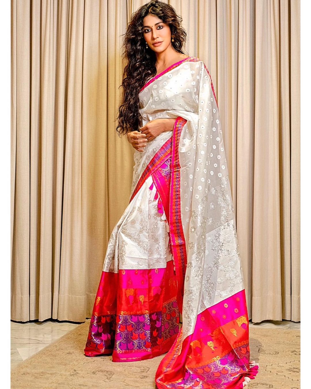 Chitrangda Singh is a picture of elegance in the white saree with the vibrant border.