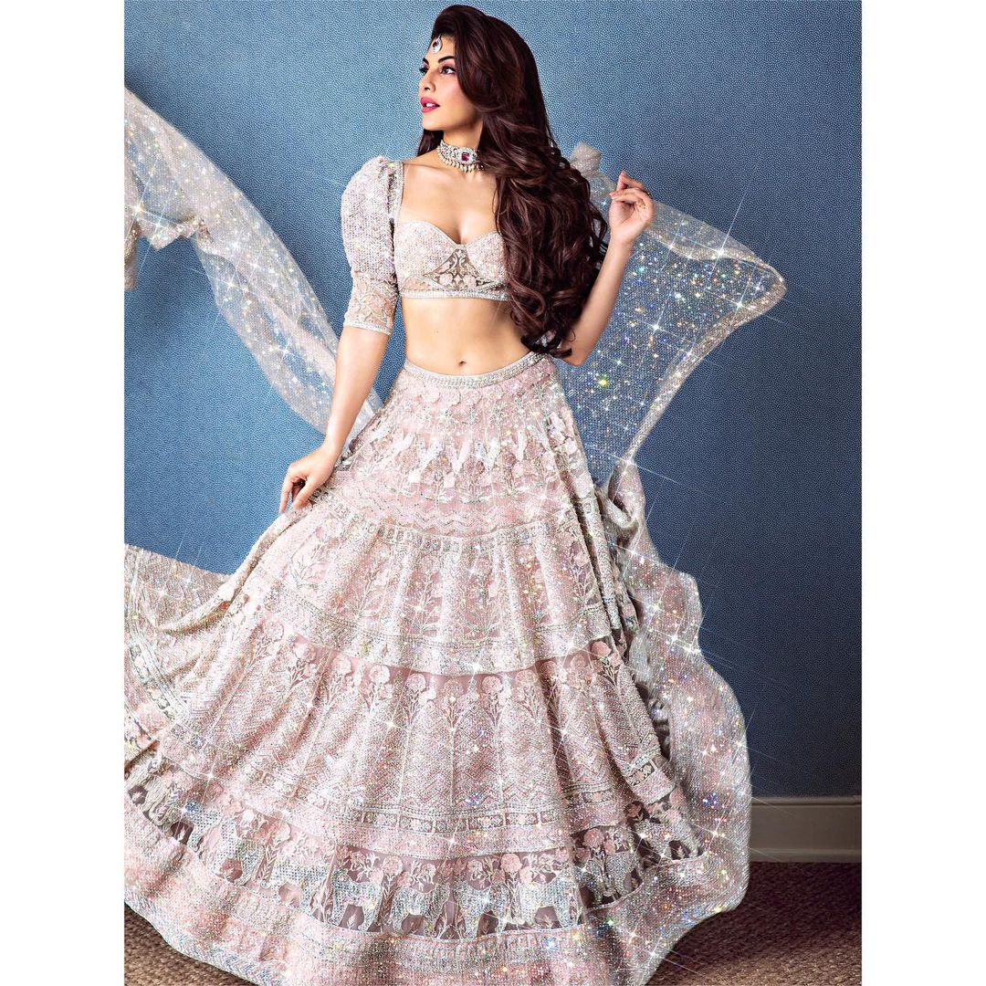 Jacqueline Fernandez in sheer saree and bralette proves you can never go  wrong with white