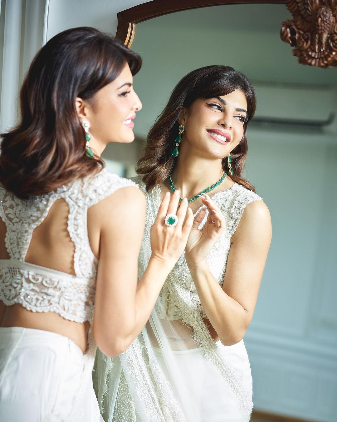 Jacqueline Fernandez pairs her saree with a lace blouse.