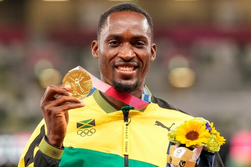 Jamaican hurdler Hansle Parchment clinched a gold medal in the men's 110-meter hurdles at Tokyo Olympics. (AP Photo)
