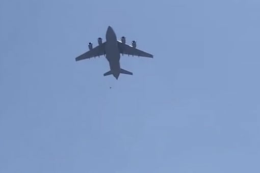 Locals near the Kabul airport said they saw three men holding themselves onto the wheels of the aircraft and later fell to their death. (Photo credit: Twitter)