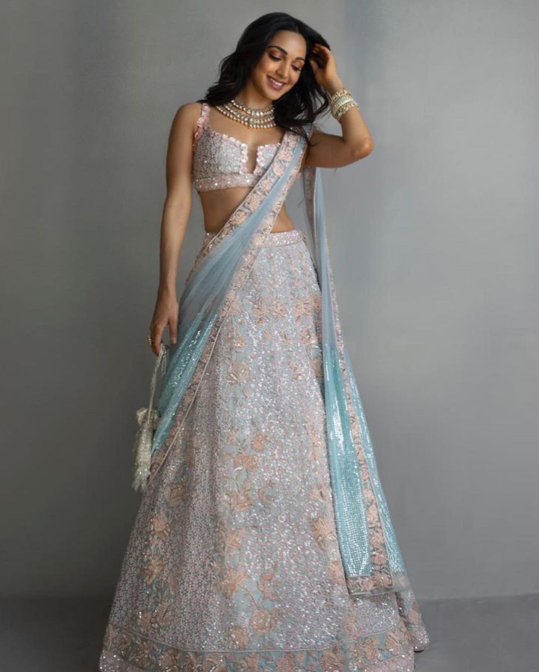 Kiara Advani keeps it gorgeous in the pastel lehenga.