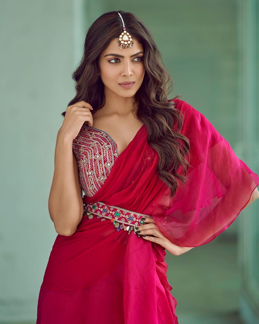 Malavika Mohanan stuns in the pink saree with the embroidered blouse.