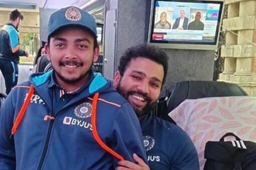 Prithvi Shaw and Rohit Sharma share a light moment. 