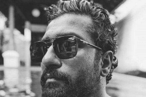 Actor Vicky Kaushal shared a monochrome picture of himself stepping out of the pool in black dazzle. 